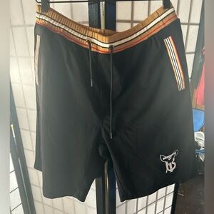 Burberry boy shorts size XXL but can fit a large for men. (NWT)see pics for det